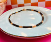 Cleo Necklace with Tiger’s Eye and Sunstone gemstone beads on white jewelry tray