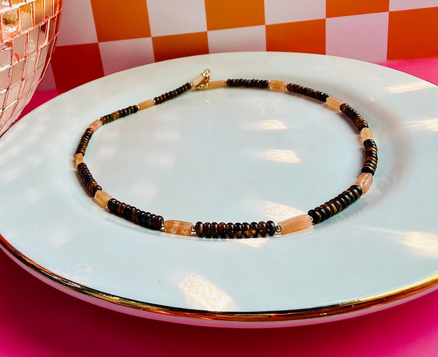 Cleo Necklace with Tiger’s Eye and Sunstone gemstone beads on white jewelry tray