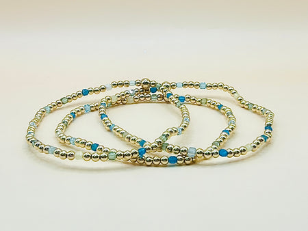 Gold filled beaded bracelets with blue apatite cube beads