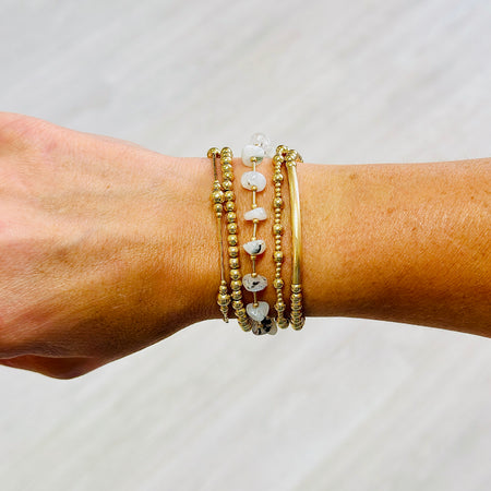 Moonstone gemstone bracelet styled with gold-filled bracelets for an everyday stack